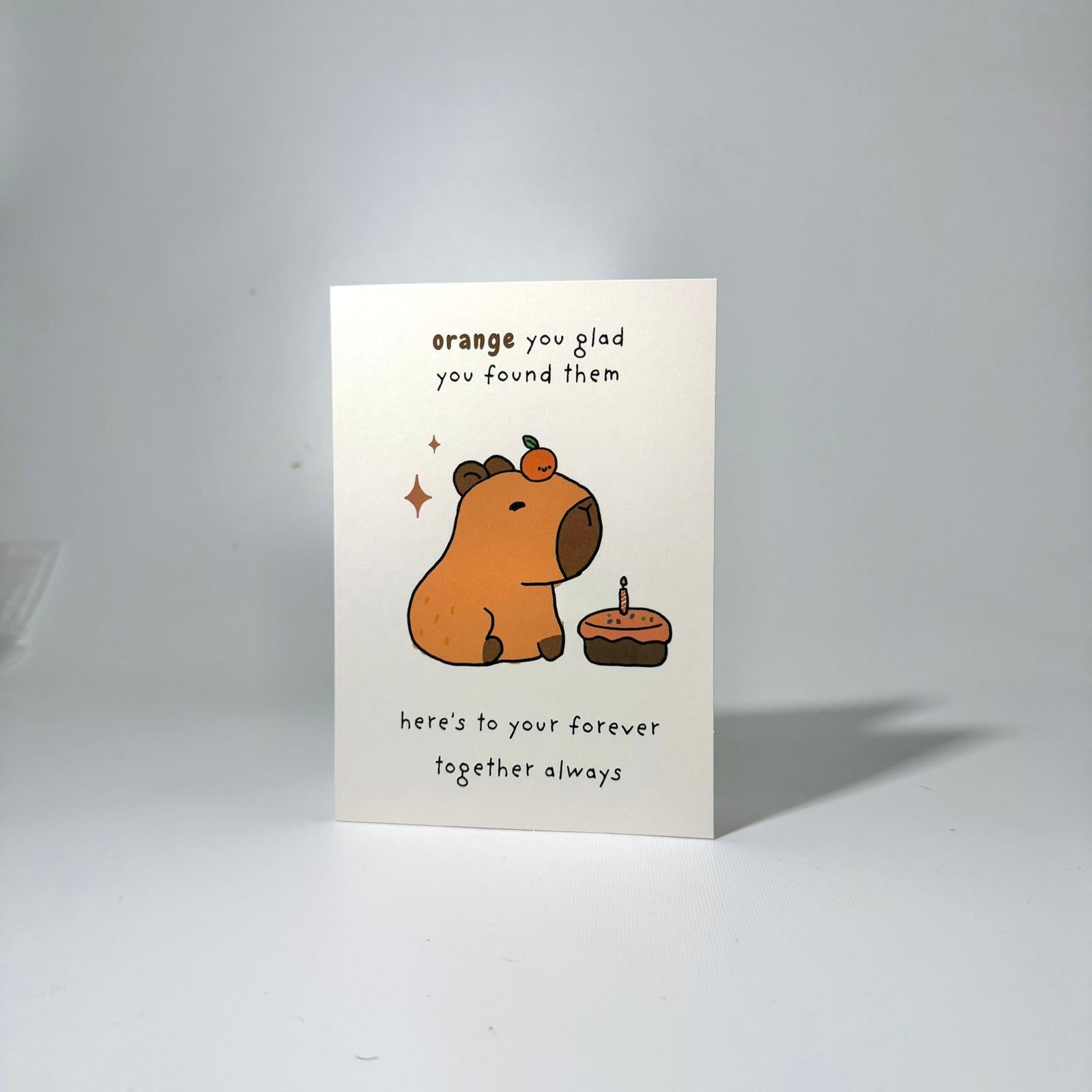 Brown Cake Capybara Romance Greeting Card